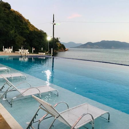 Apartamento pé na areia frente para o Mar e piscina na Prainha Caraguatatuba Exterior foto