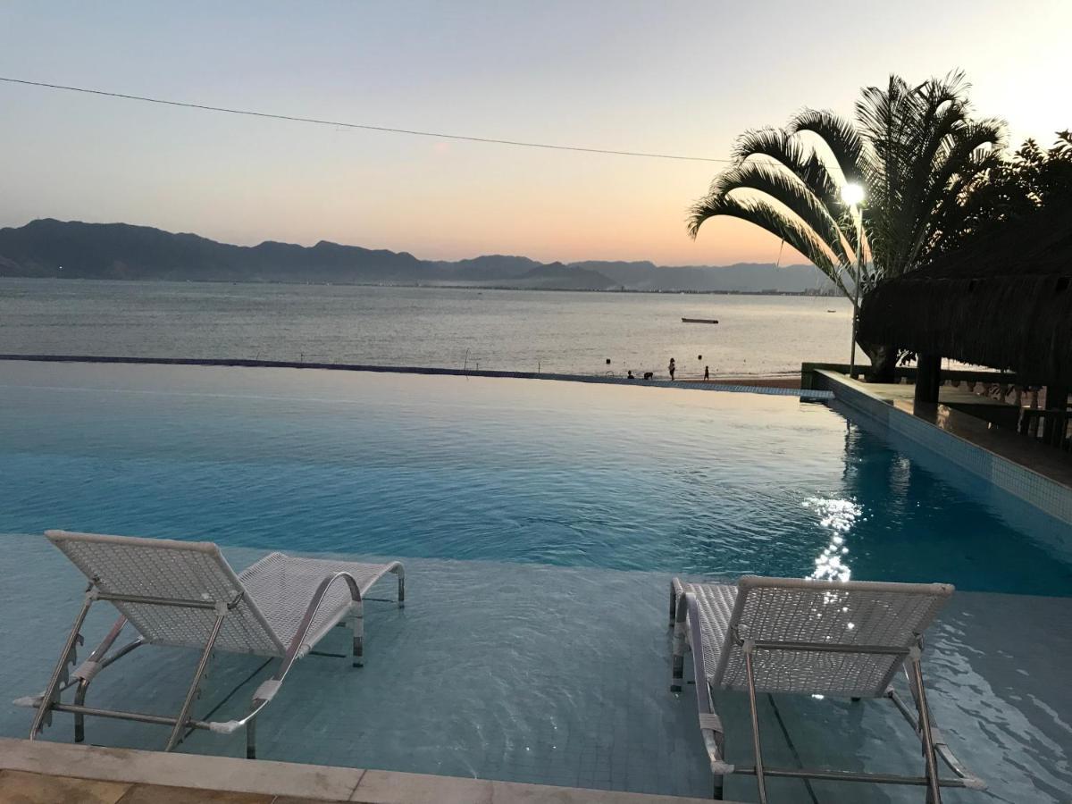 Apartamento pé na areia frente para o Mar e piscina na Prainha Caraguatatuba Exterior foto
