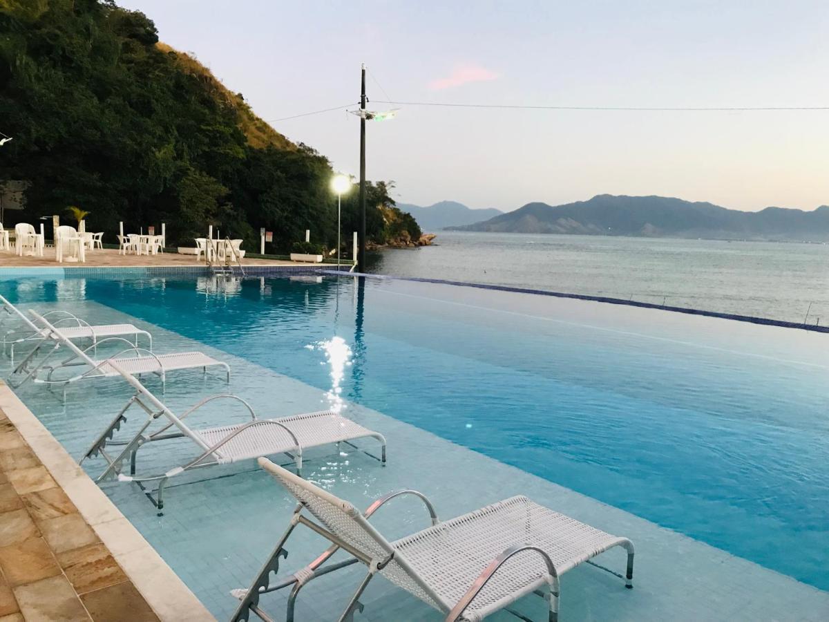 Apartamento pé na areia frente para o Mar e piscina na Prainha Caraguatatuba Exterior foto