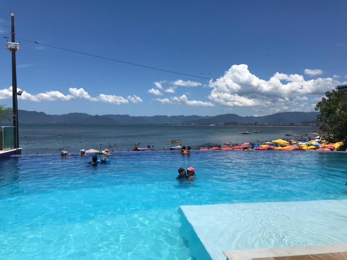 Apartamento pé na areia frente para o Mar e piscina na Prainha Caraguatatuba Exterior foto