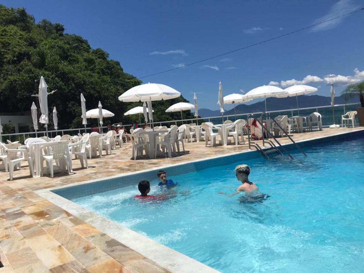 Apartamento pé na areia frente para o Mar e piscina na Prainha Caraguatatuba Exterior foto